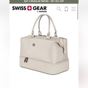 Cream colored Swiss gear weekender bag